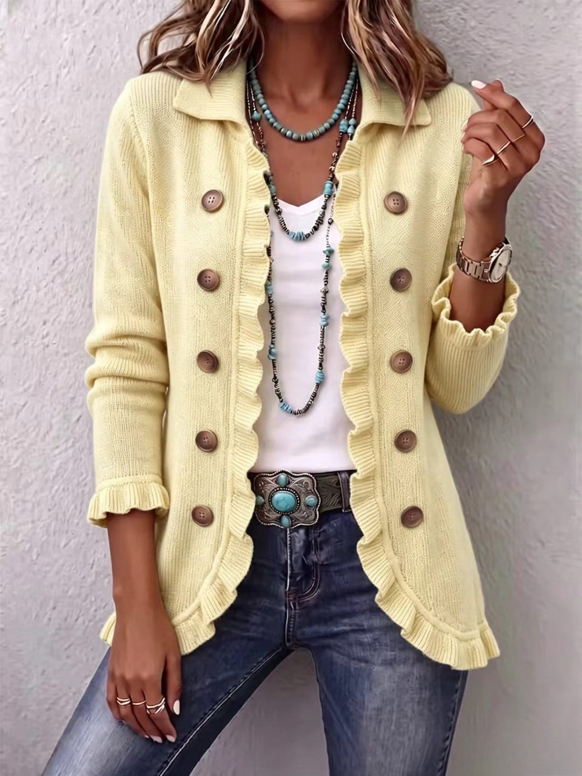 Chaqueta de punto crema con volantes Elvira